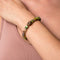 Metaphysical | Gold Buddha | Olive Green Striped Agate Bracelet