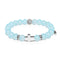 St. Clare of Assisi | White Gold Cross | Sky Blue Agate Bracelet
