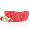 18K Gold and Red Coral on a Red Leather Wrap